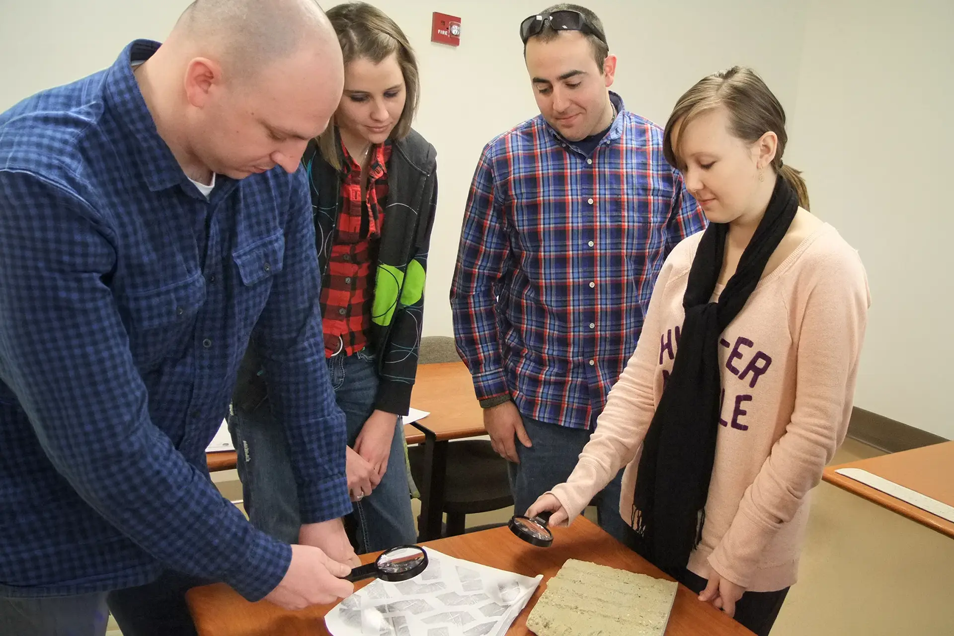 Criminal Justice Students Examining Evidence